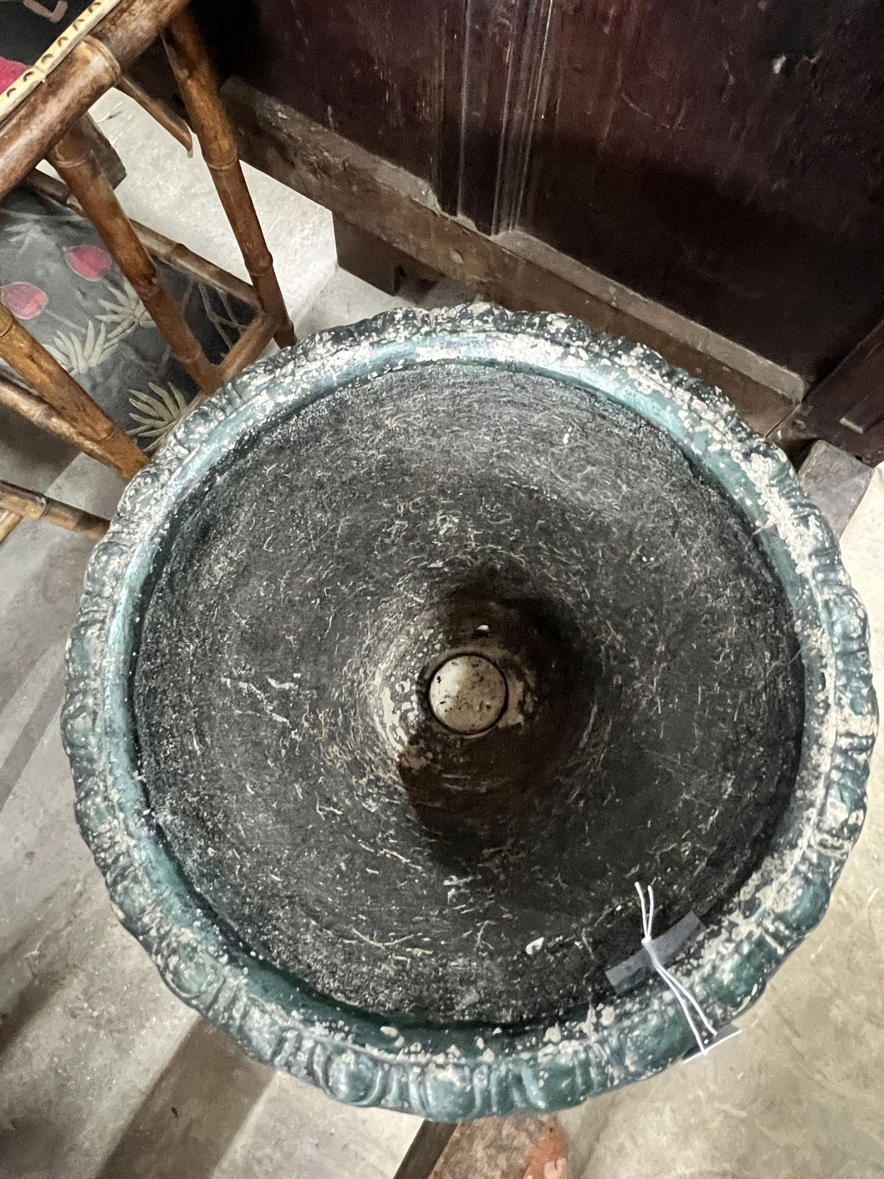 A circular painted reconstituted stone garden urn, diameter 48cm, height 64cm